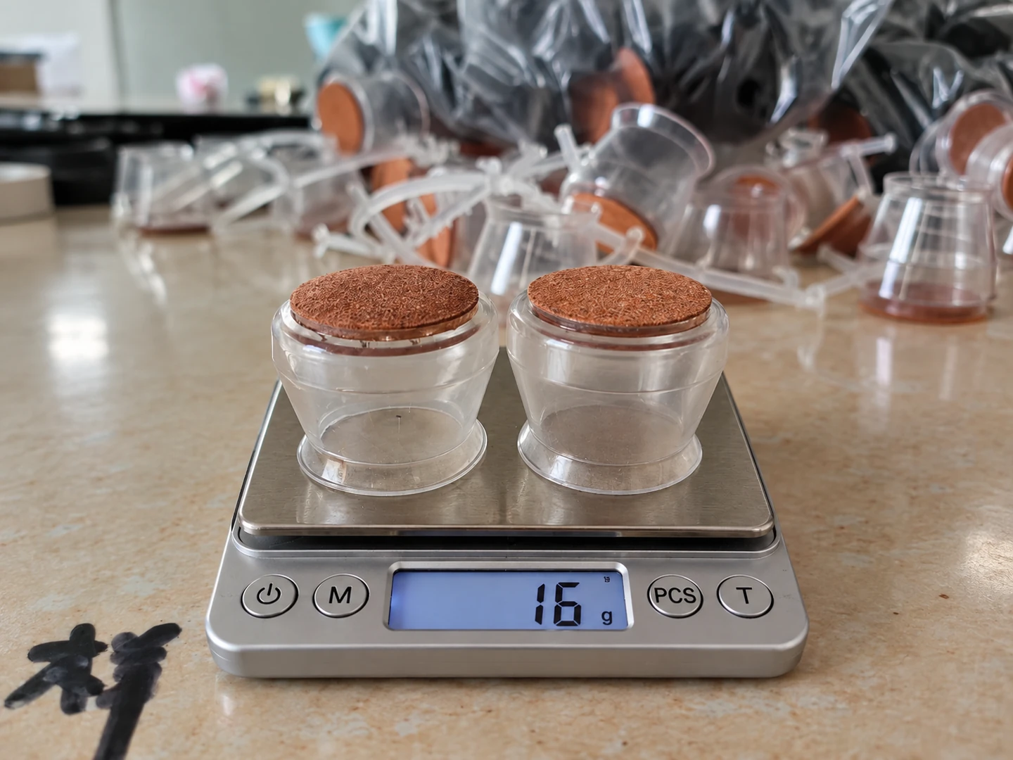 Furniture leg caps being weighed
